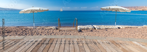 Morning relaxing atmosphere at a public beach at the Red SEa, MIddle East