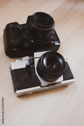 classic film cameras on a wooden background