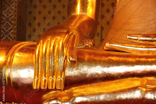 gloden hand of big gold buddha photo