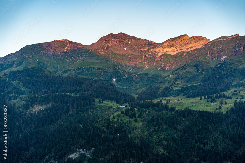 Mountain Ridge getting the first sunrays of the day Mountain Ridge getting the first sunrays of the day