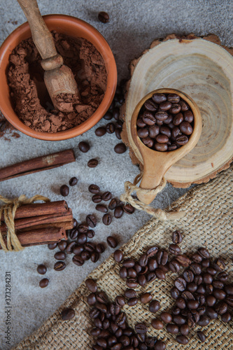 composition of coffee beans, shecolade, cinnamon and cocoa © Тетяна Линник