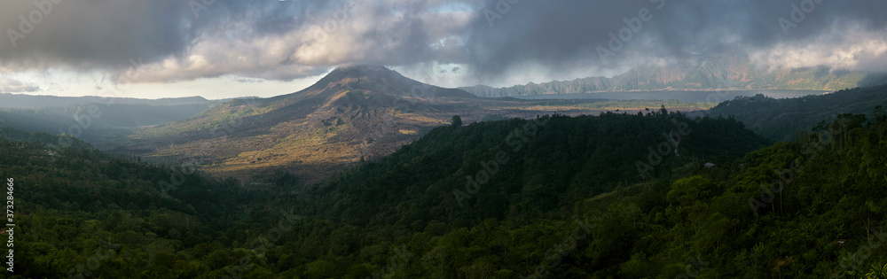 panorama of high volcano with clouds on Bali island