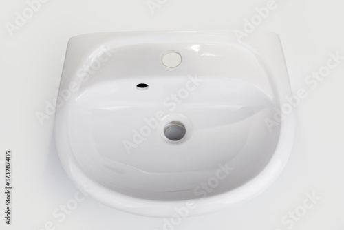New washbasin on a white background
