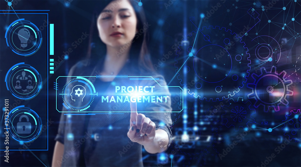 Business, Technology, Internet and network concept. Young businessman working on a virtual screen of the future and sees the inscription: Business, Technology, Internet and network concept. Young businessman working on a virtual screen of the future and sees the inscription: