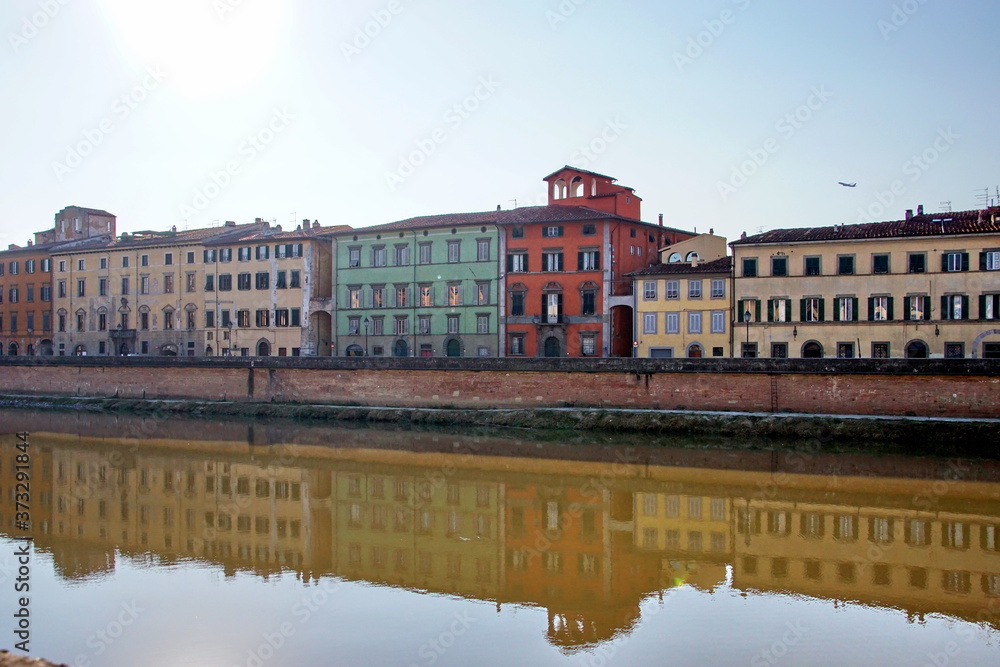 Lungarno Antonio Pacinotti and the tidal river Arno in Pisa, Tuscany, Italy