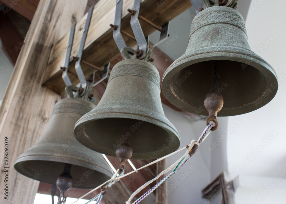 Three bells in the bell tower for notification of the Church Liturgy