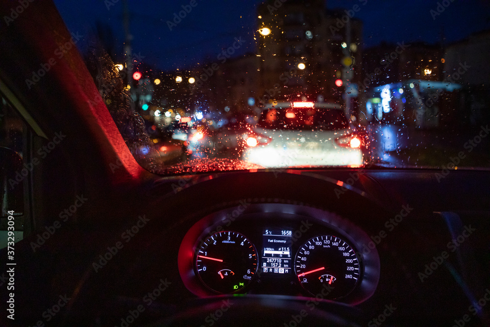 city night traffic rainy weather