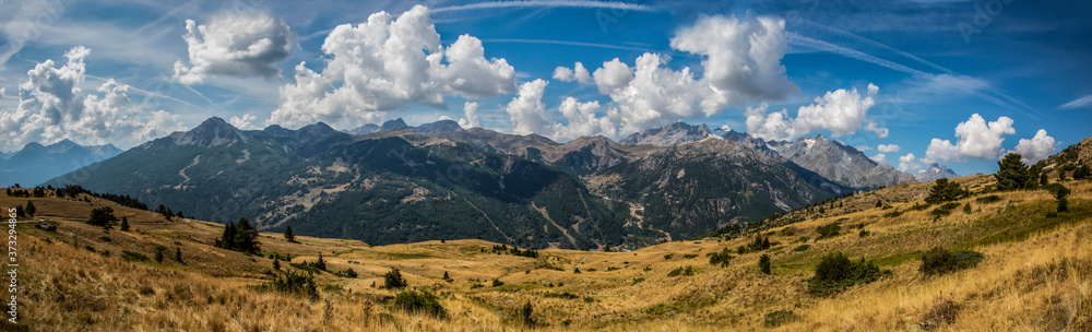 Panoramic image of  the Massif des Ecrins seen from the road climbing to Col du Granon.