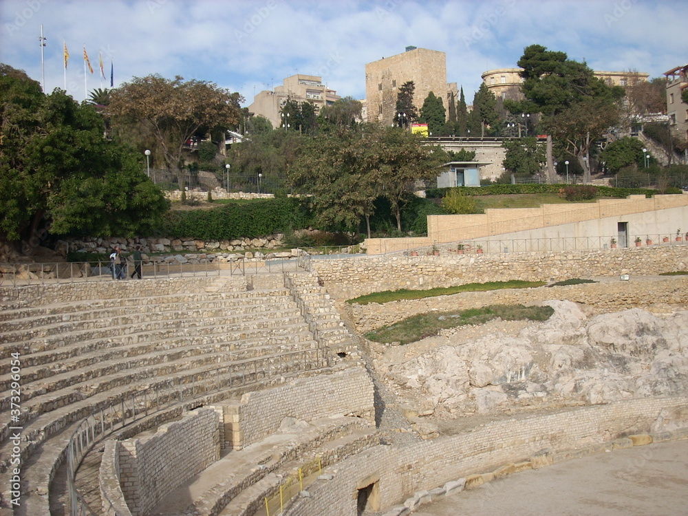 ancient roman amphitheater in the middle of the city