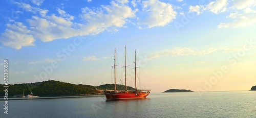 sailing boats at sunset