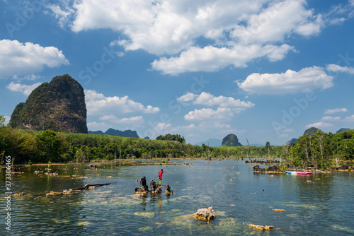 Happy kids play at lake of Klong Rood, Krabi © Blanscape