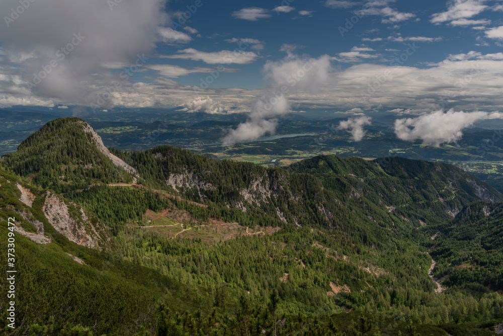 Valley from part of hill Mittagskogel in south Austria in summer hot day