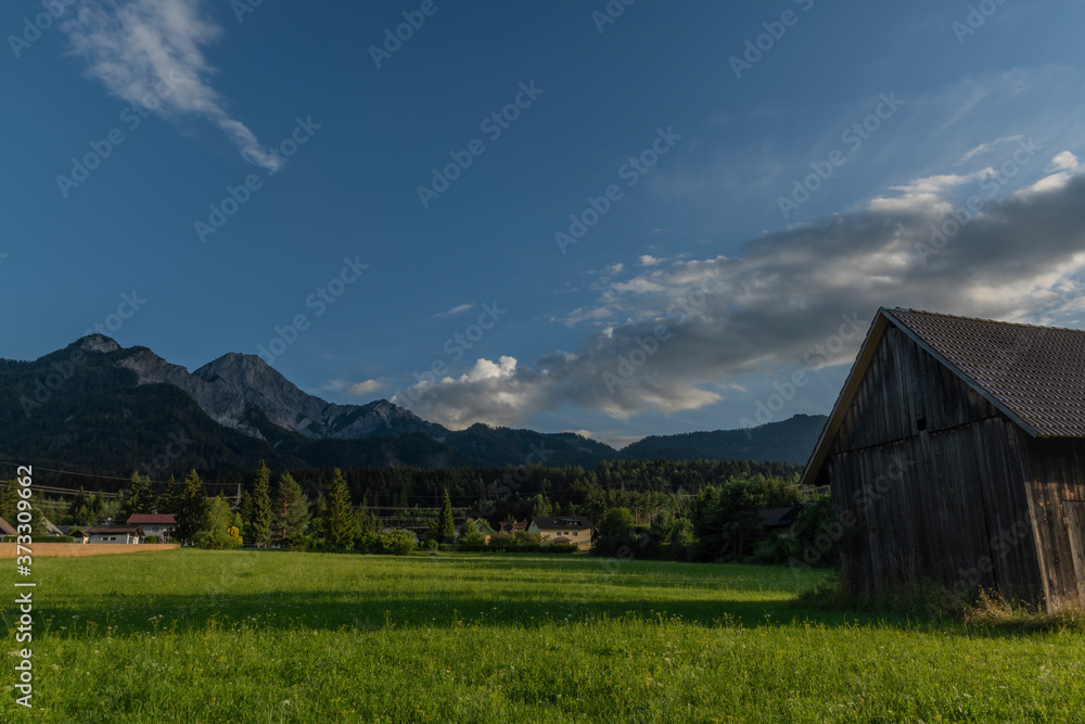 Color evening with cloudy blue sky in Ledenitzen village in south Austria