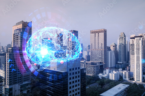 Glowing human brain hologram, aerial panoramic cityscape of Bangkok at sunset. The center of business education in Asia. Double exposure.