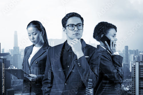 Photography Group of three business colleagues in suits working and dreaming about new career opportunities after MBA graduation