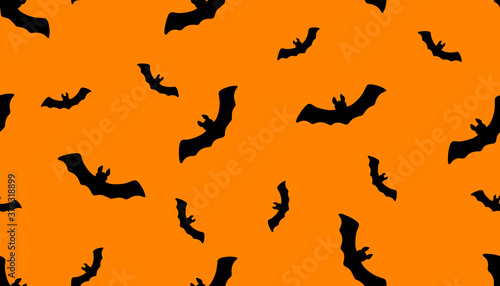 Vector illustration. Seamless pattern with bats isolated on orange. Hand drawn simple doodle clipart in a trendy style. Halloween theme. For banner  cards  wrapping  autumn projects  fabric  textile.