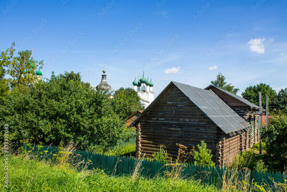 panoramic view of the historical city with ancient architecture on a clear summer day against the blue clear sky and green trees and copy space in Rostov Russia panoramic view of the historical city with ancient architecture on a clear summer day against the blue clear sky and green trees and copy space in Rostov Russia