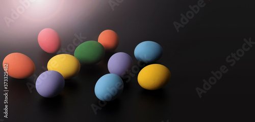 Multi-colorful of easter eggs on background in studio with close-up shot which include many colour such as yellow  green  blue  purple  red covered on eggs by art painting