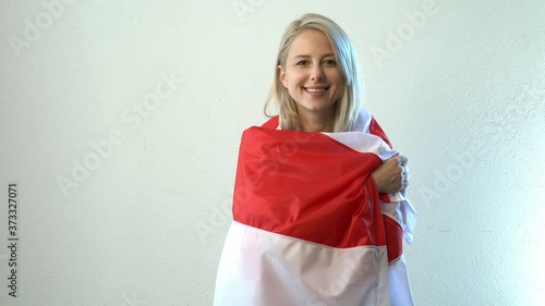 Blonde woman with Belarus flag photo