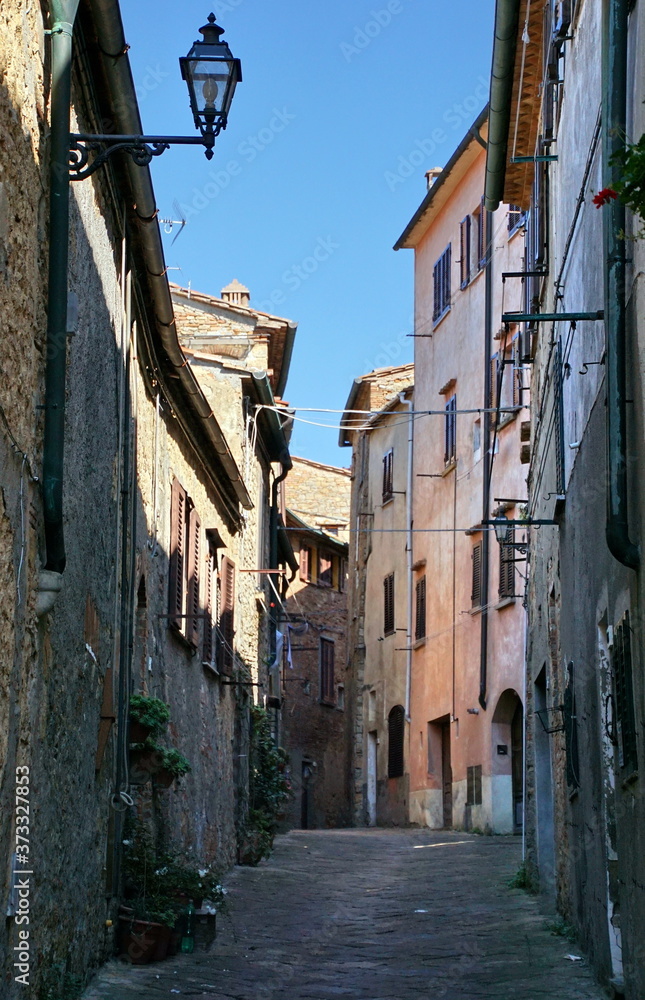 Charming narrow streets of Volterra town in Tuscany Italy