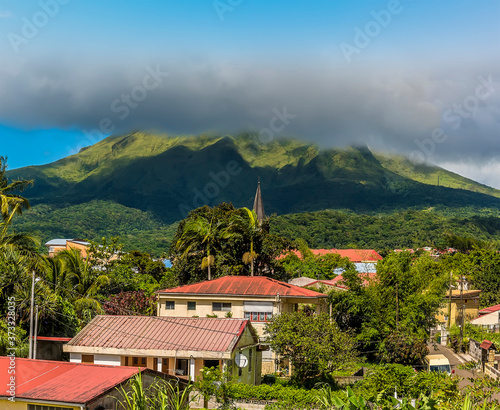 A view across a settlement at the foot of the volcano, Mount Pelee in Martinique