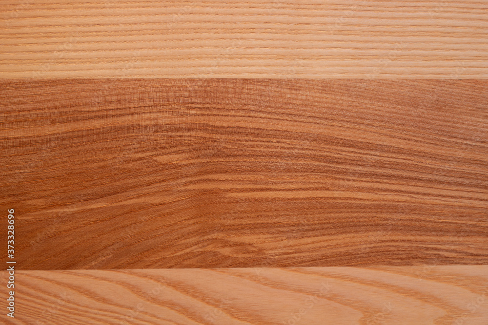 Fototapeta premium The structure of natural ash wood, tinted oak. Hardwood. Creative vintage background. Imitation of aging.
