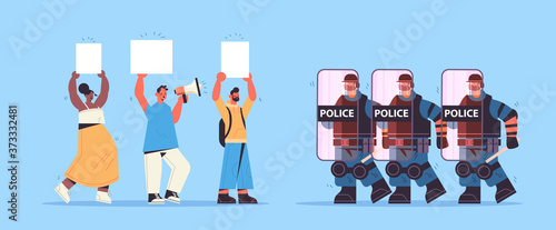 policemen in full tactical gear riot police officers attacking street protesters with placards during clashes demonstration protest concept full length horizontal vector illustration