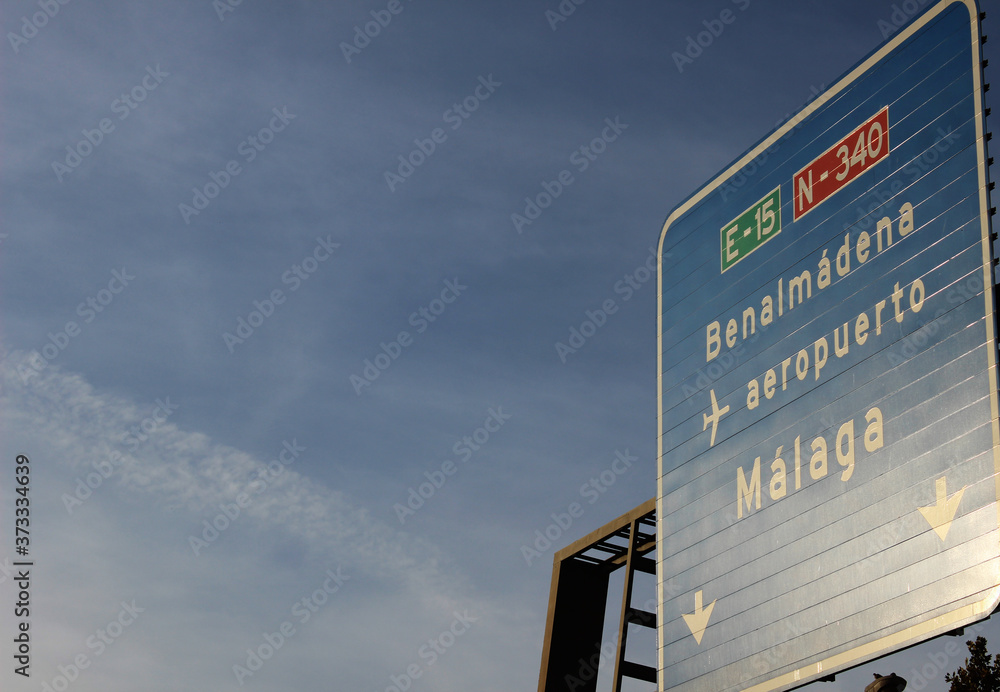 Road sign indicating the city of Benalmádena, in the province of Malaga (Spain) Road sign indicating the city of Benalmádena, in the province of Malaga (Spain)
