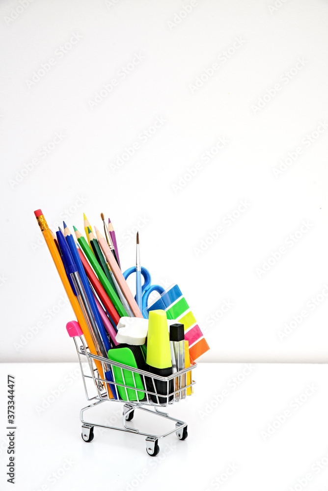 School stationery in the shopping cart photography School stationery in the shopping cart photography