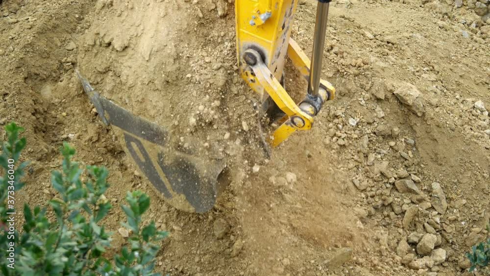Excavator buckets dumping soil. 4k Time Lapse. Backhoes working