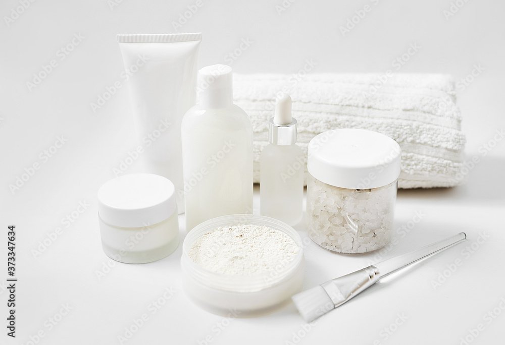 Flat lay composition Natural cosmetics ingredients for skincare, body and hair care.Top view bottles with facial treatment product white background. Makeup Layout. Set of traditional spa products. Flat lay composition Natural cosmetics ingredients for skincare, body and hair care.Top view bottles with facial treatment product white background. Makeup Layout. Set of traditional spa products.