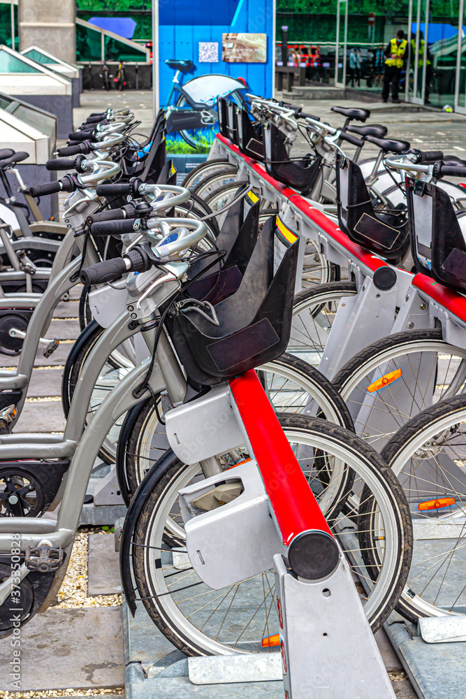 City bike Parking with parked bicycles City bike Parking with parked bicycles