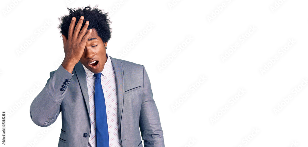 Handsome african american man with afro hair wearing business jacket yawning tired covering half face, eye and mouth with hand. face hurts in pain. Handsome african american man with afro hair wearing business jacket yawning tired covering half face, eye and mouth with hand. face hurts in pain.