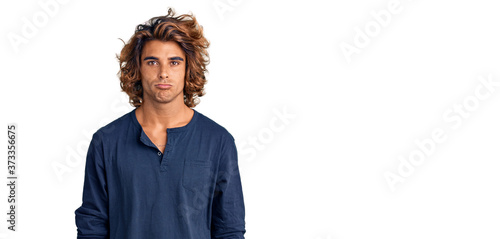 Young hispanic man wearing casual clothes depressed and worry for distress, crying angry and afraid. sad expression.