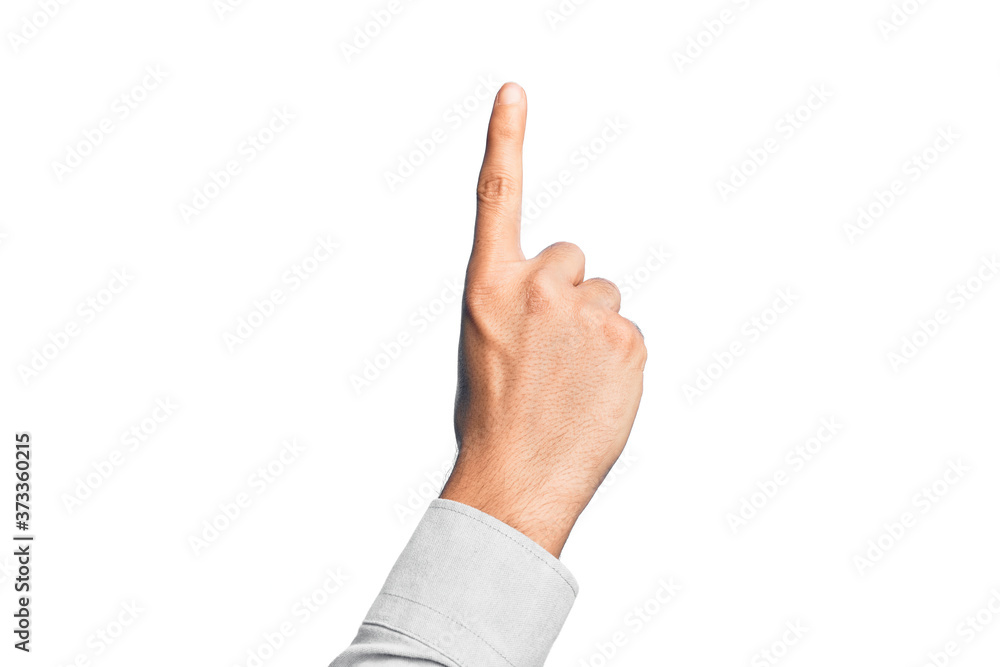 Hand of caucasian young man showing fingers over isolated white background counting number one using index finger, showing idea and understanding Hand of caucasian young man showing fingers over isolated white background counting number one using index finger, showing idea and understanding