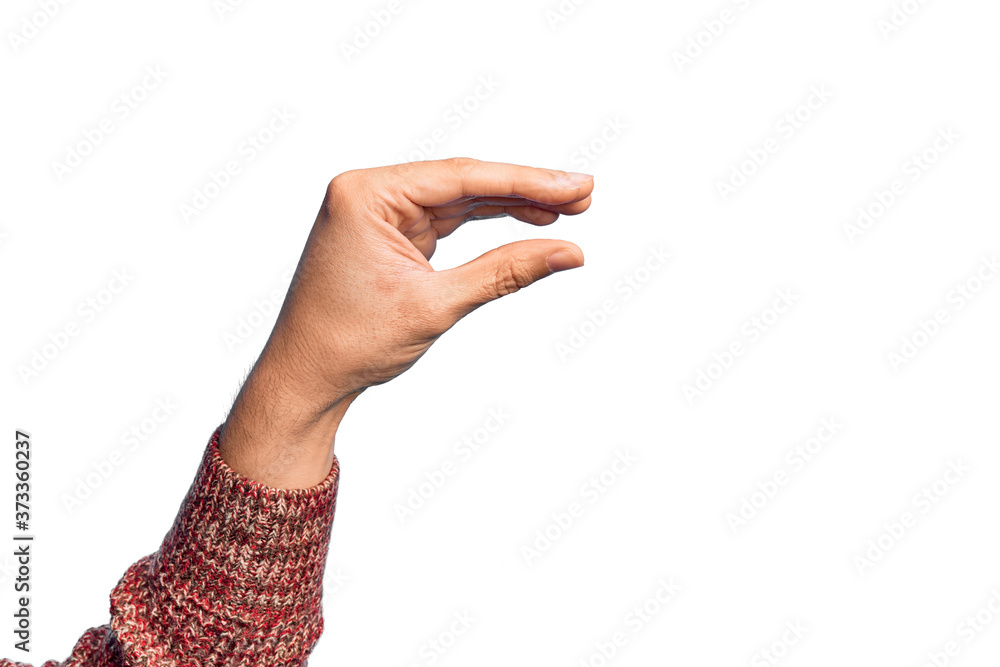 Hand of caucasian young man showing fingers over isolated white background picking and taking invisible thing, holding object with fingers showing space