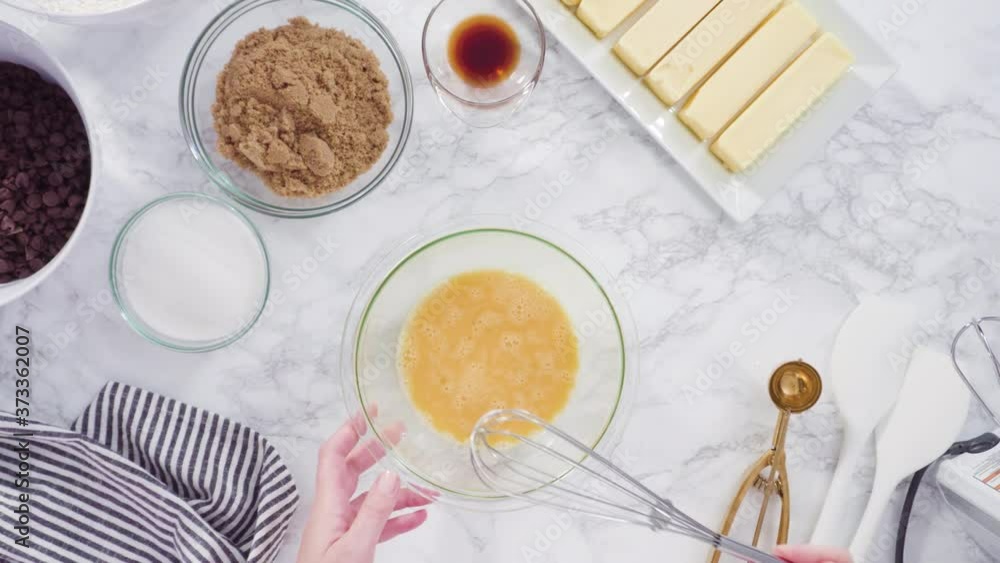 Step by step. Flat lay. Mixing ingredients in a glass bowl to make chocolate chip cookies. Step by step. Flat lay. Mixing ingredients in a glass bowl to make chocolate chip cookies.