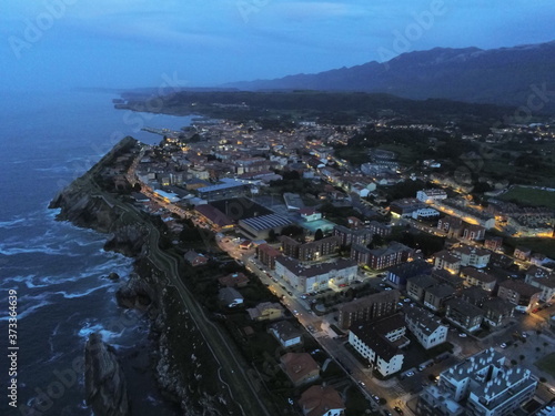 Llanes, beautiful coastal village in Asturias. Spain. Aerial Drone Photo © VEOy.com