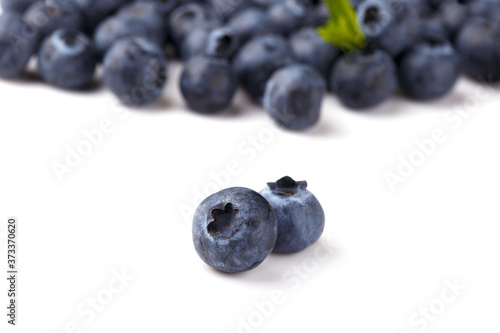 Ripe blueberries isolated over white