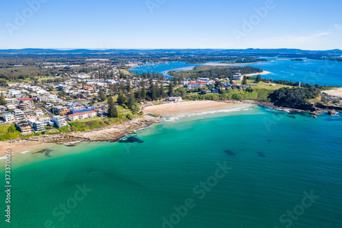 Yamba main beach and ocean pool bath aerial photograph on blue sky sunny day