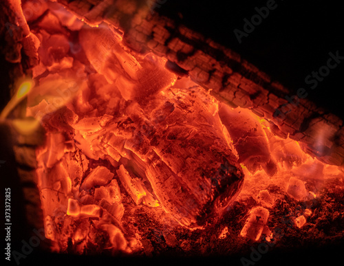 Wood Coals Glow in Fire Pit