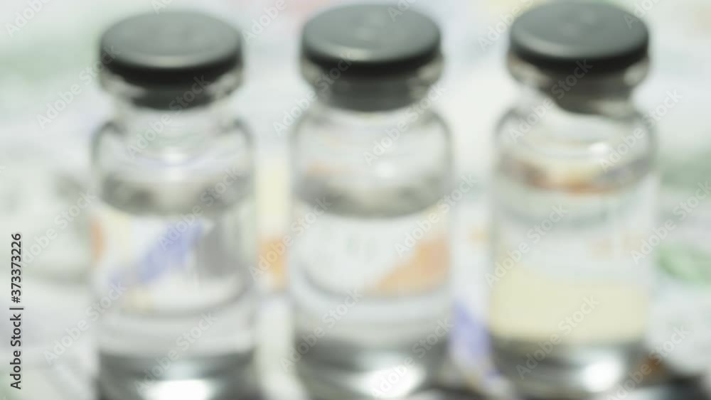 Development of vaccines for deadly viruses like Covid-19, AIDS and Ebola demonstrated with vials of medicine for immunization Development of vaccines for deadly viruses like Covid-19, AIDS and Ebola demonstrated with vials of medicine for immunization