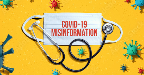 Covid-19 Misinformation theme with medical mask and stethoscope photo