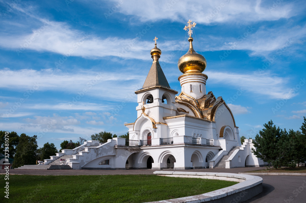 Khabarovsk, Russia, July 31, 2020:Seraphim of Sarov temple against the blue sky in summer in the Northern Park of Khabarovsk