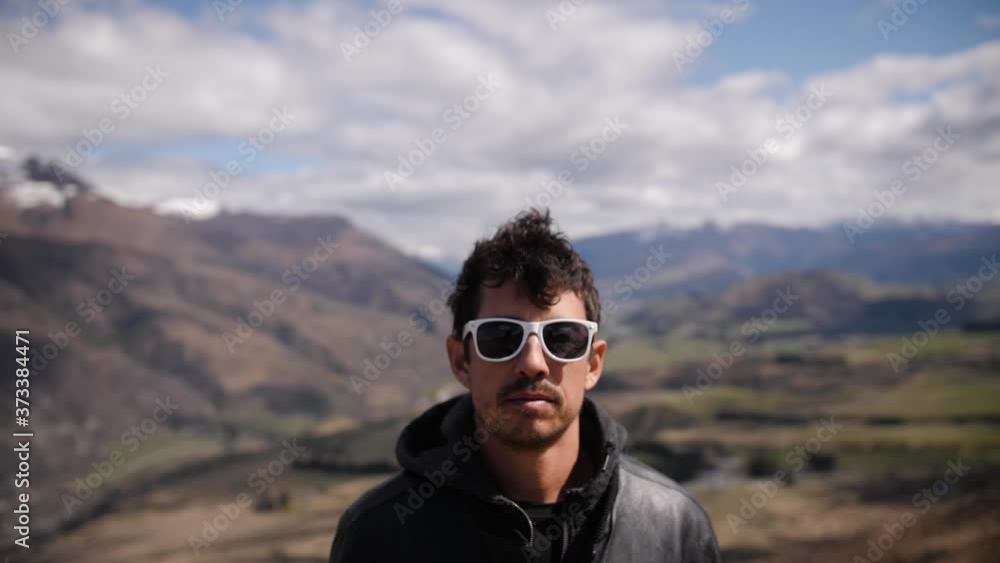 Man walks up to camera slow motion travel moutains Man walks up to camera slow motion travel moutains
