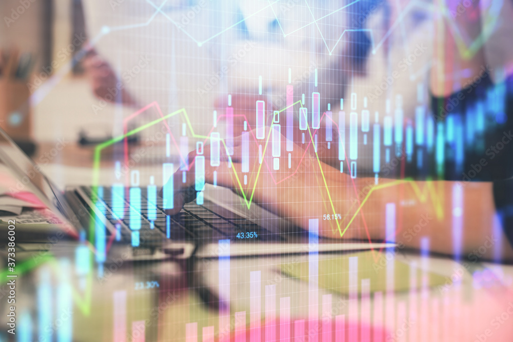 Multi exposure of woman hands typing on computer and financial graph hologram drawing. Stock market analysis concept. Multi exposure of woman hands typing on computer and financial graph hologram drawing. Stock market analysis concept.