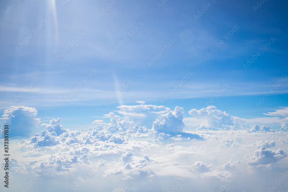 Sky and clouds from above the ground viewed from an airplane Sky and clouds from above the ground viewed from an airplane