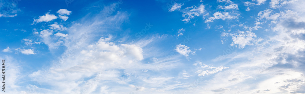 Beautiful Blue Sky Background with Tiny Clouds. Panorama Picture for Summer Season. 