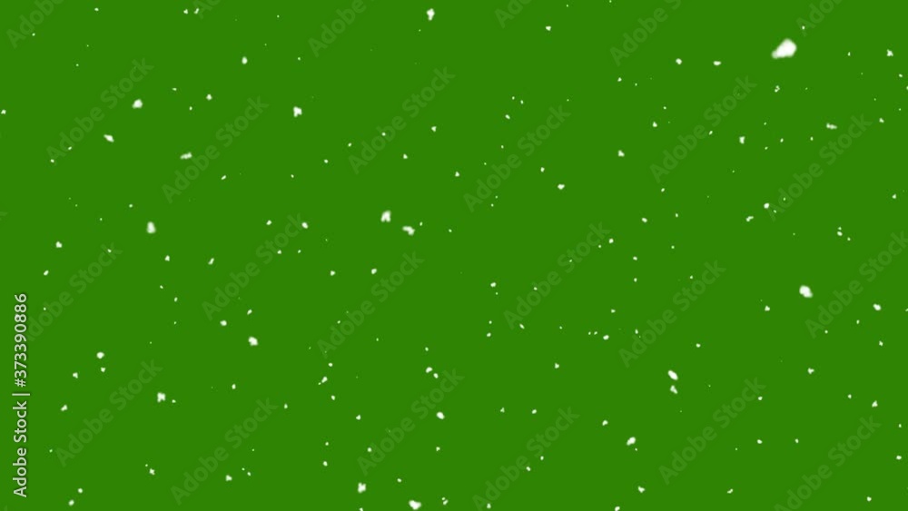 Snow falling on green background Snow falling on green background