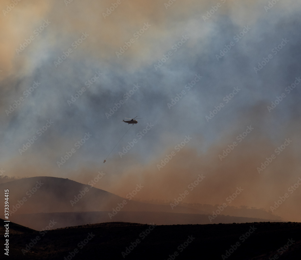 fire and smoke with helicopter